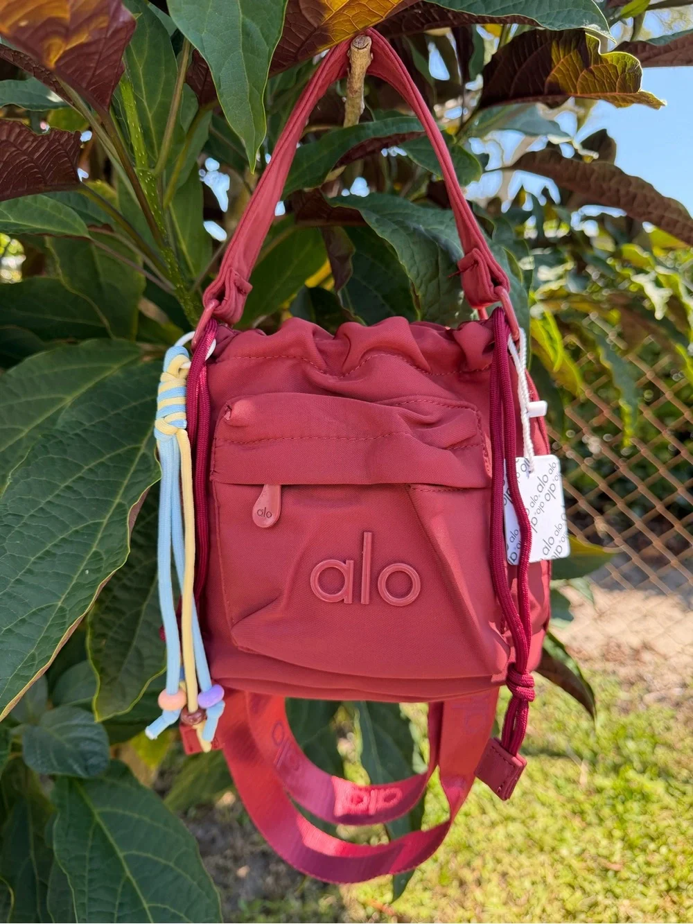 ALO Yoga Burgundy  Drawstring Mini Bucket Bag with Multicolor Cord Tassels